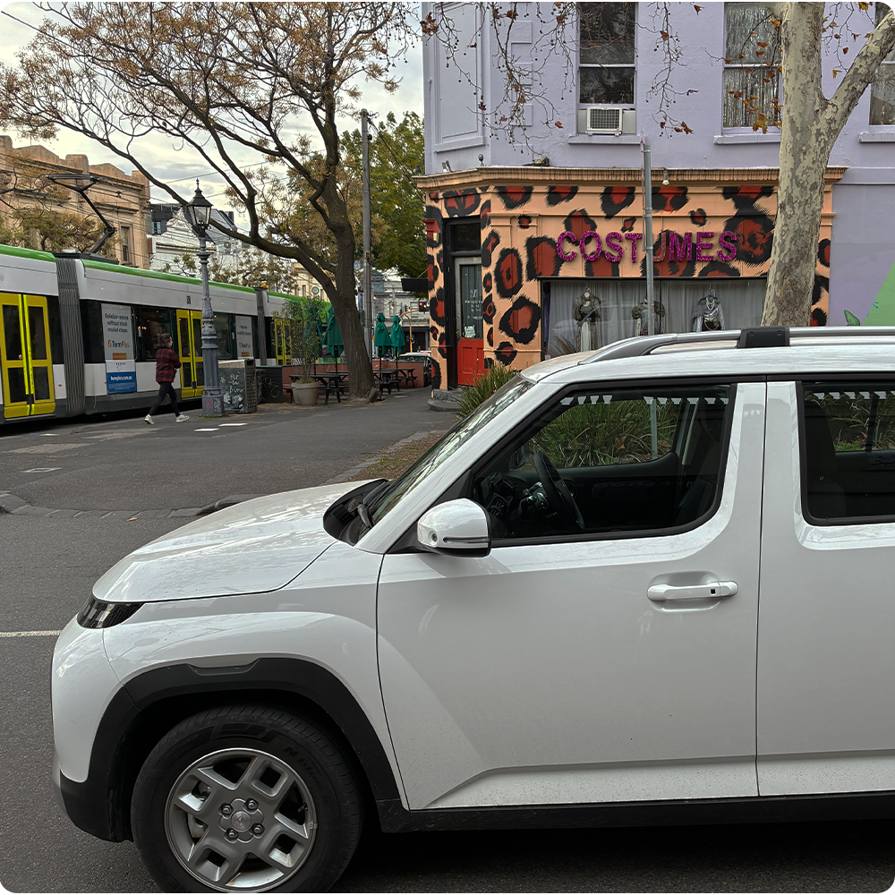 Hyundai Inster with tram